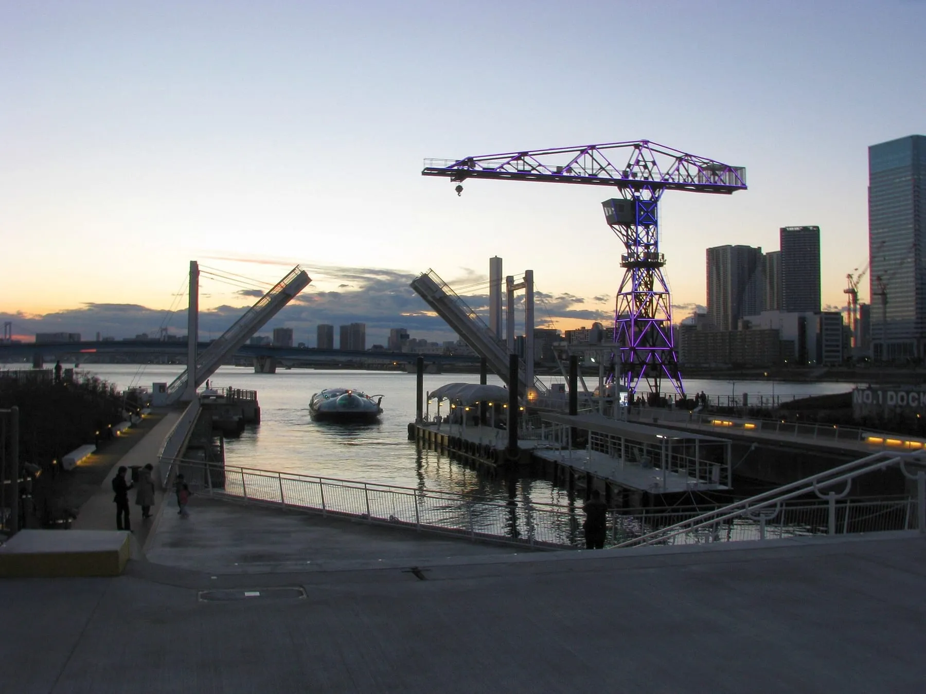 The Toyosu canal side with an old harbour crane, a short walk from Shin-Toyosu Station